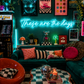 Neon sign that says 'these are the days'  in a retro-themed, maximalist living room with decor elements.