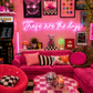 Neon sign that says 'these are the days'  in a retro-themed, maximalist living room with decor elements.